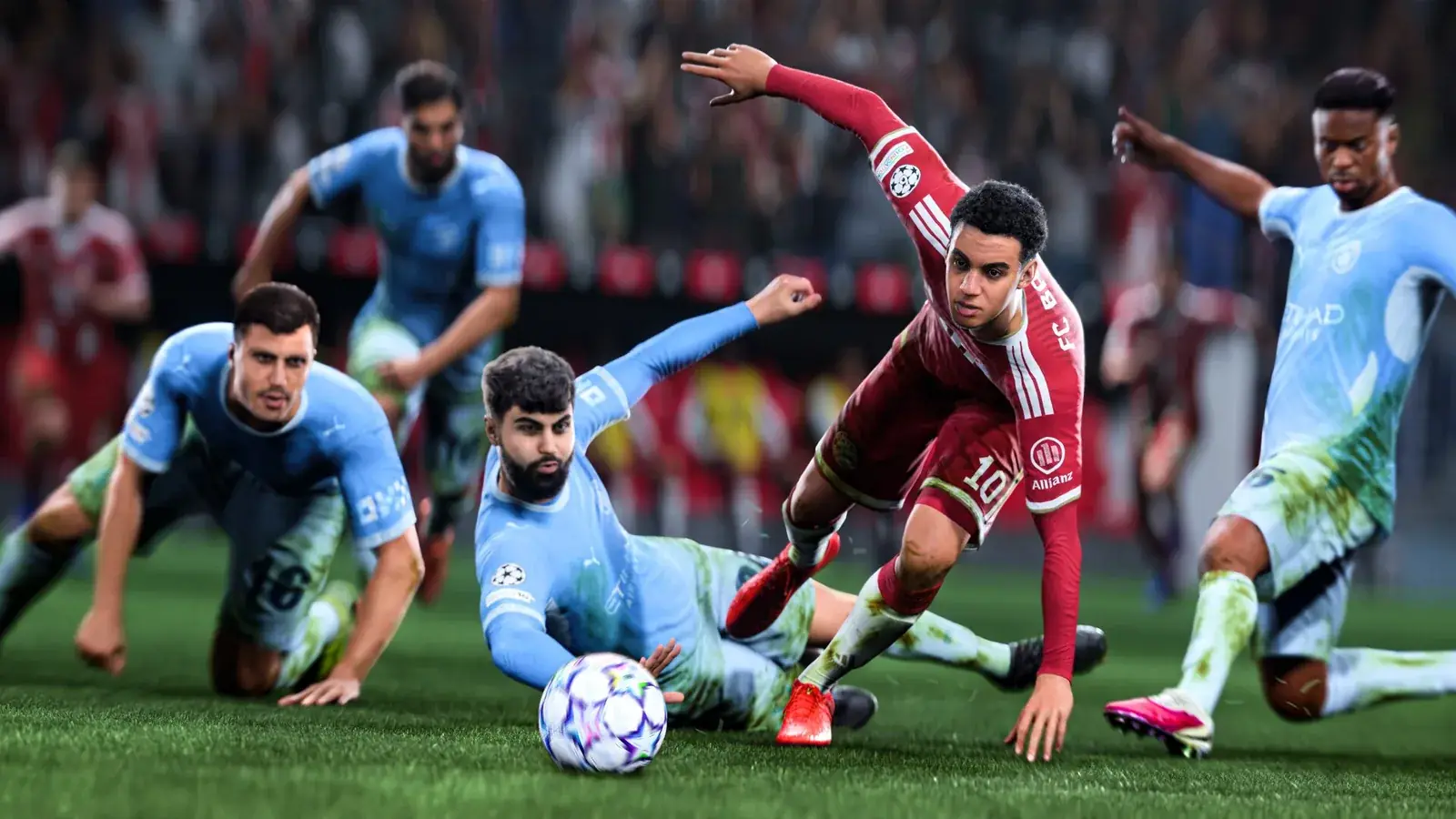 Hráči Manchesteru City v modrém v souboji v pokutovém území
