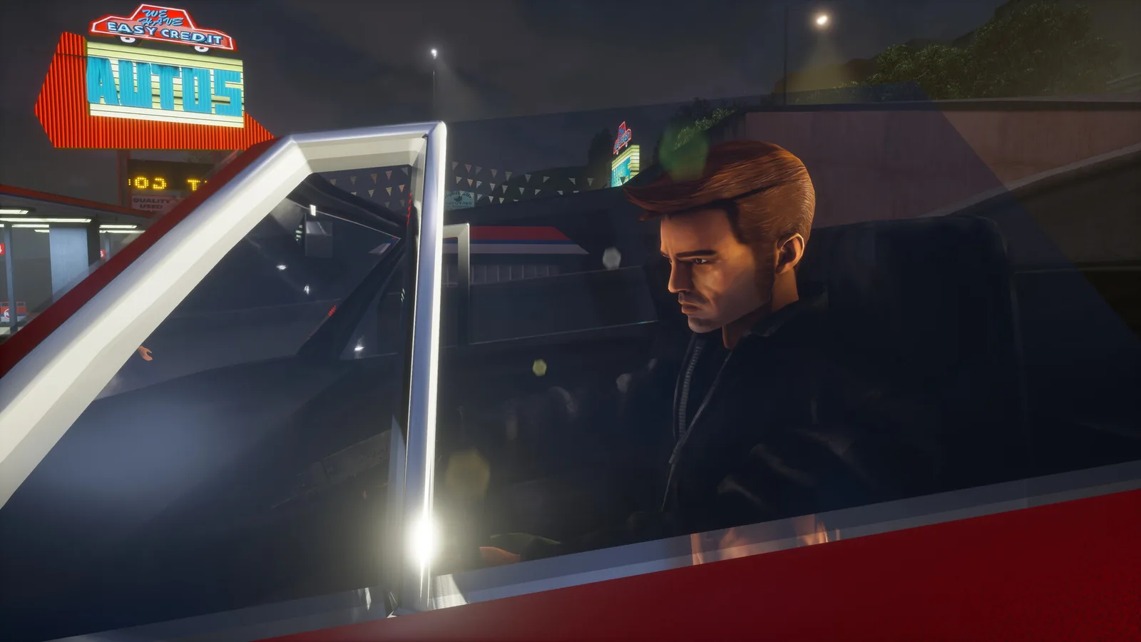 GTA III Definitive Edition: hlavní postava za volantem červeného auta