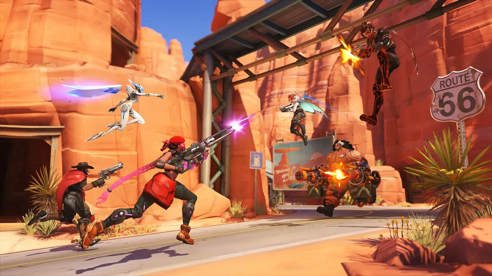 Přestřelka hrdinů Overwatch na pouštní mapě s červenými skalami