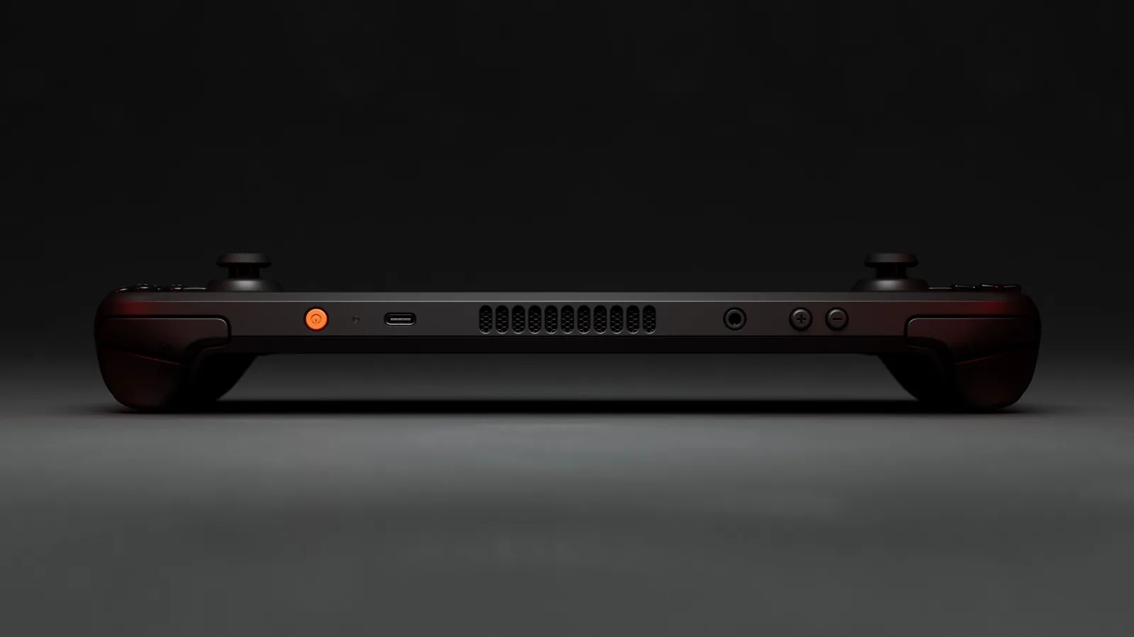 Horní hrana Steam Decku OLED s tlačítkem napájení, portem USB-C a větrací mřížkou