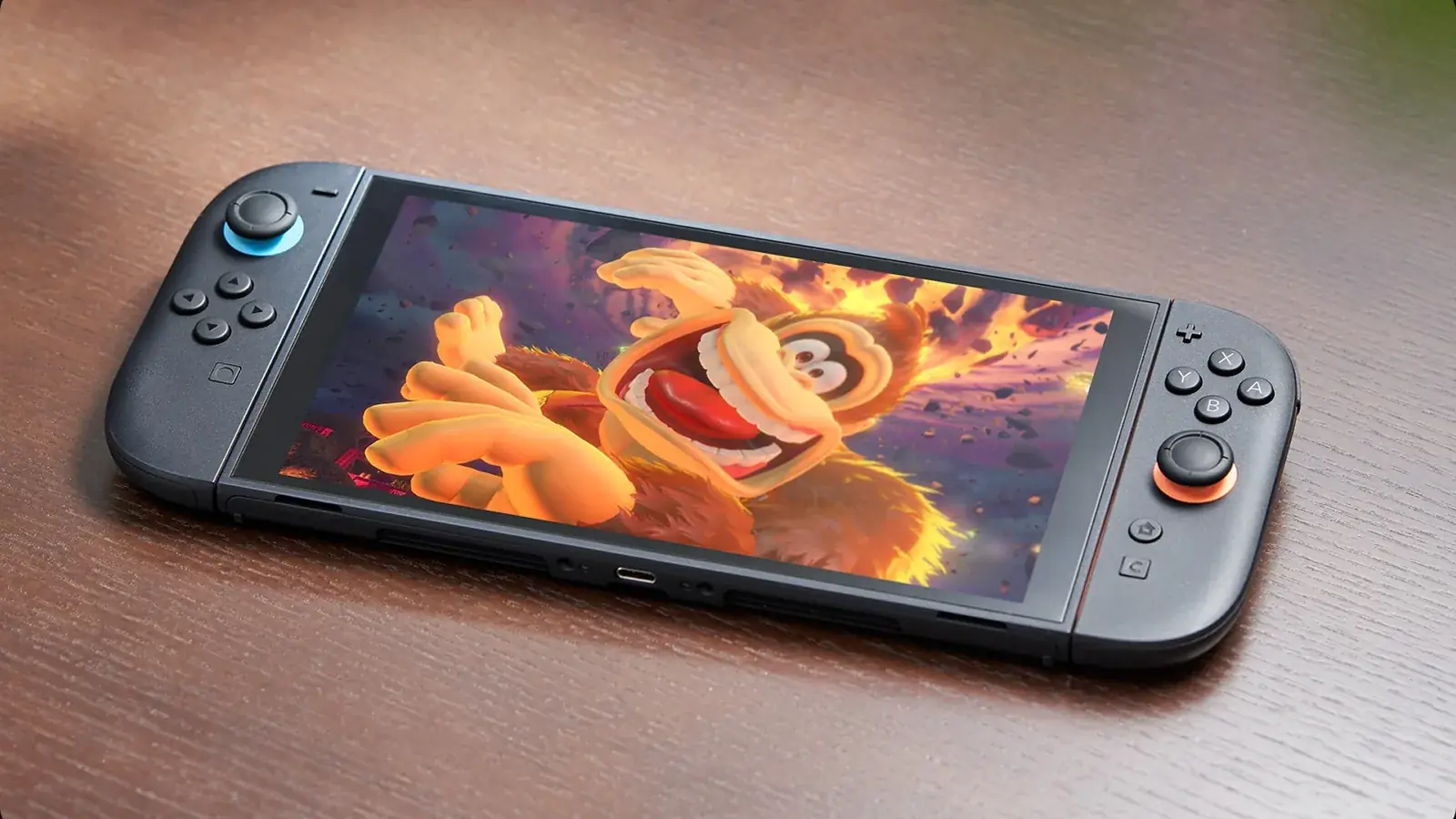 Nintendo Switch 2 na stole, na displeji Donkey Kong Bananza