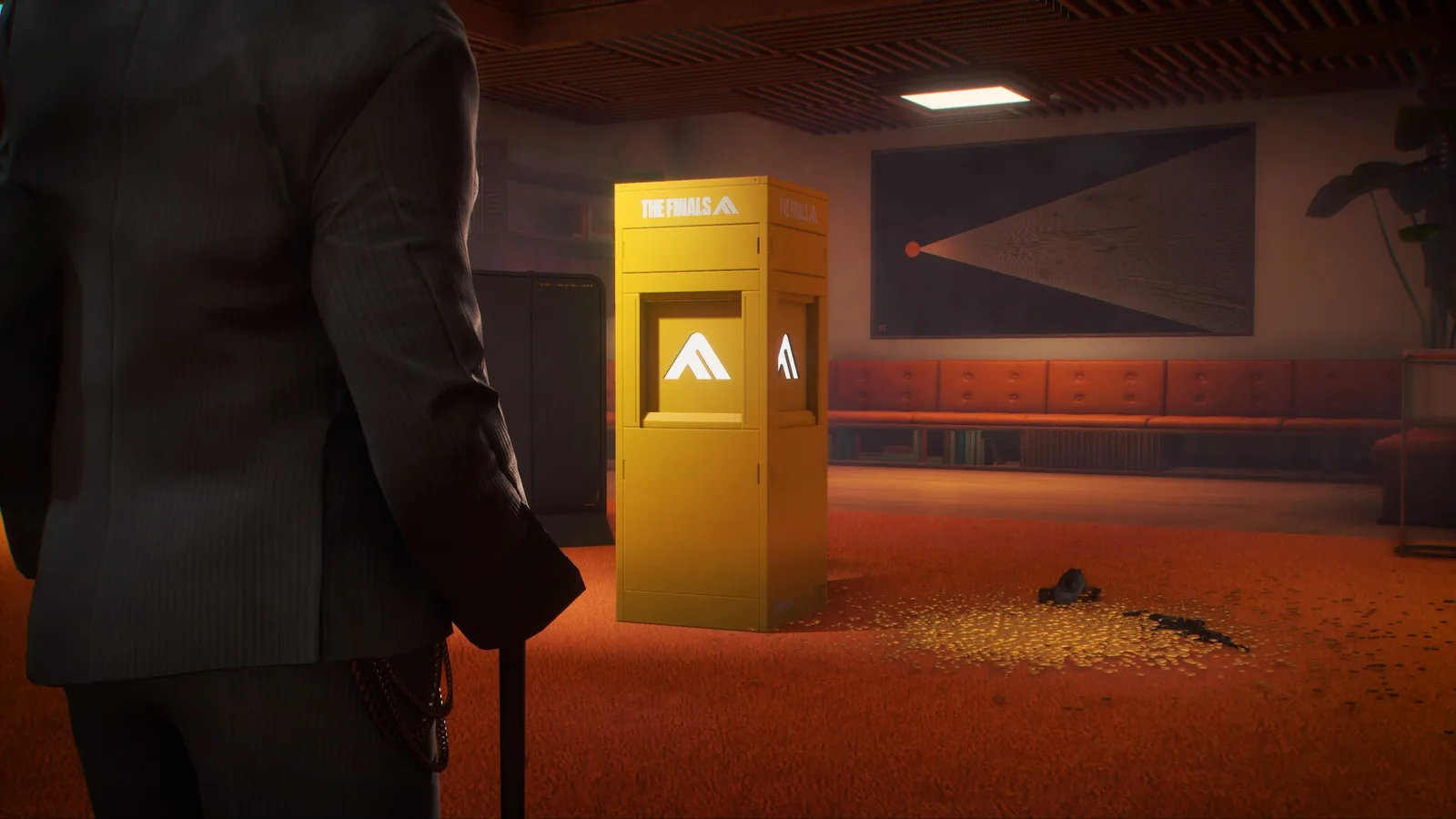 Místnost se žlutou Cashout Station a soutěžící v obleku zezadu