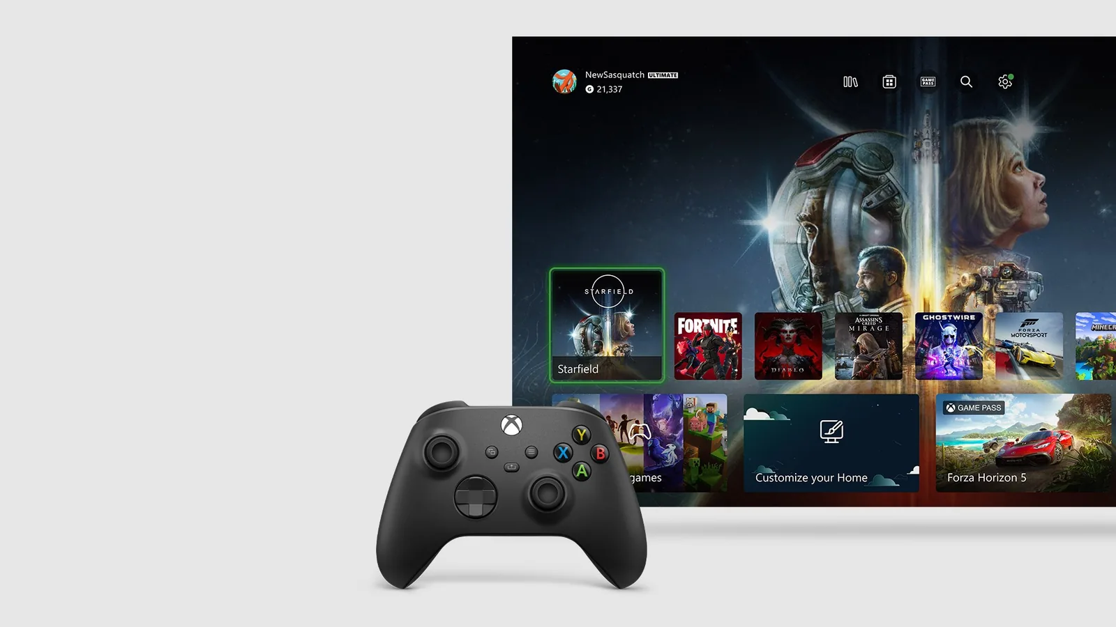 Xbox-Startbildschirm auf dem Fernseher mit Spielekacheln und schwarzem Xbox-Controller davor