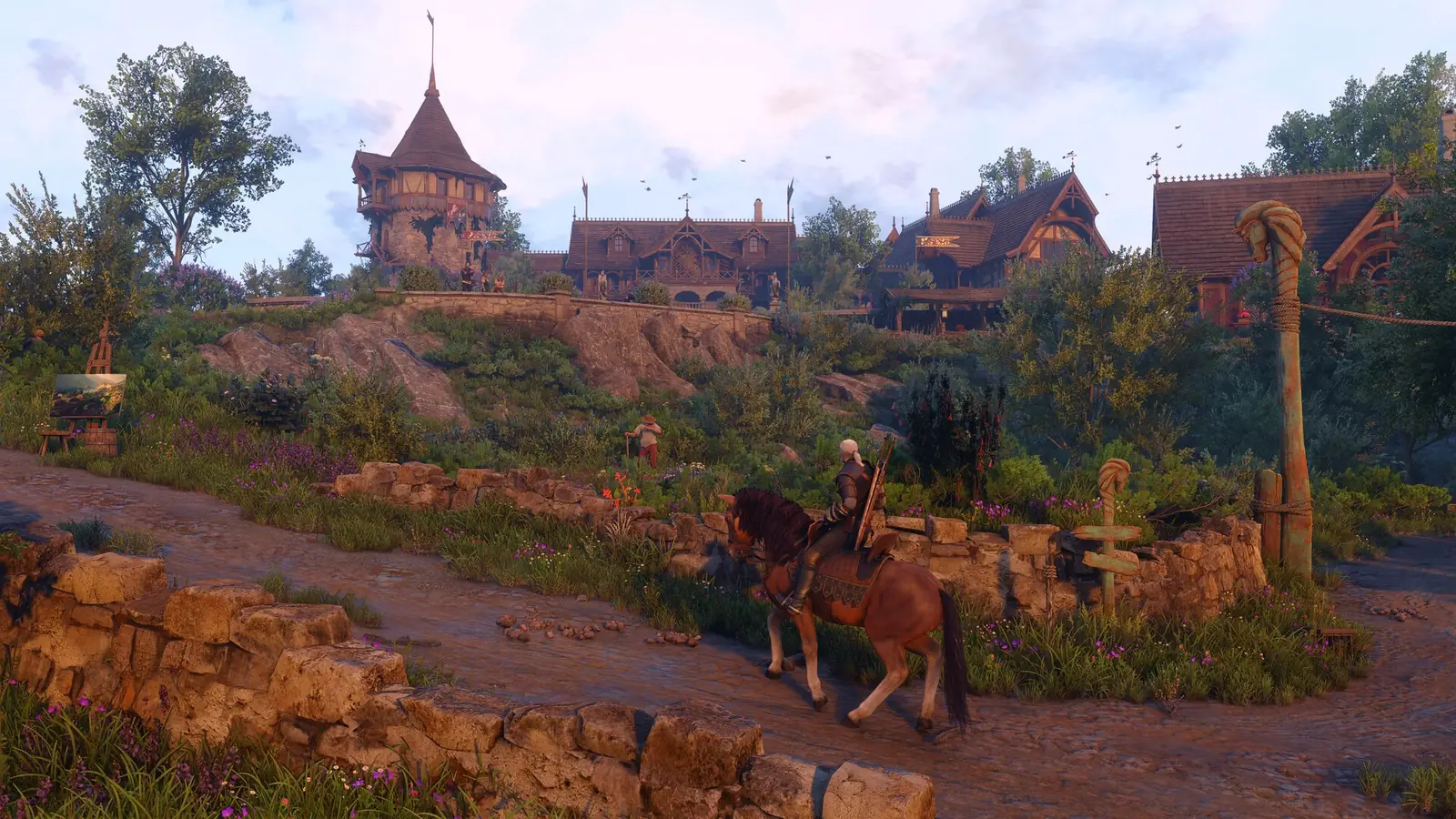 Geralt na koni ve vesnici v regionu Letten ze Songs of the Past